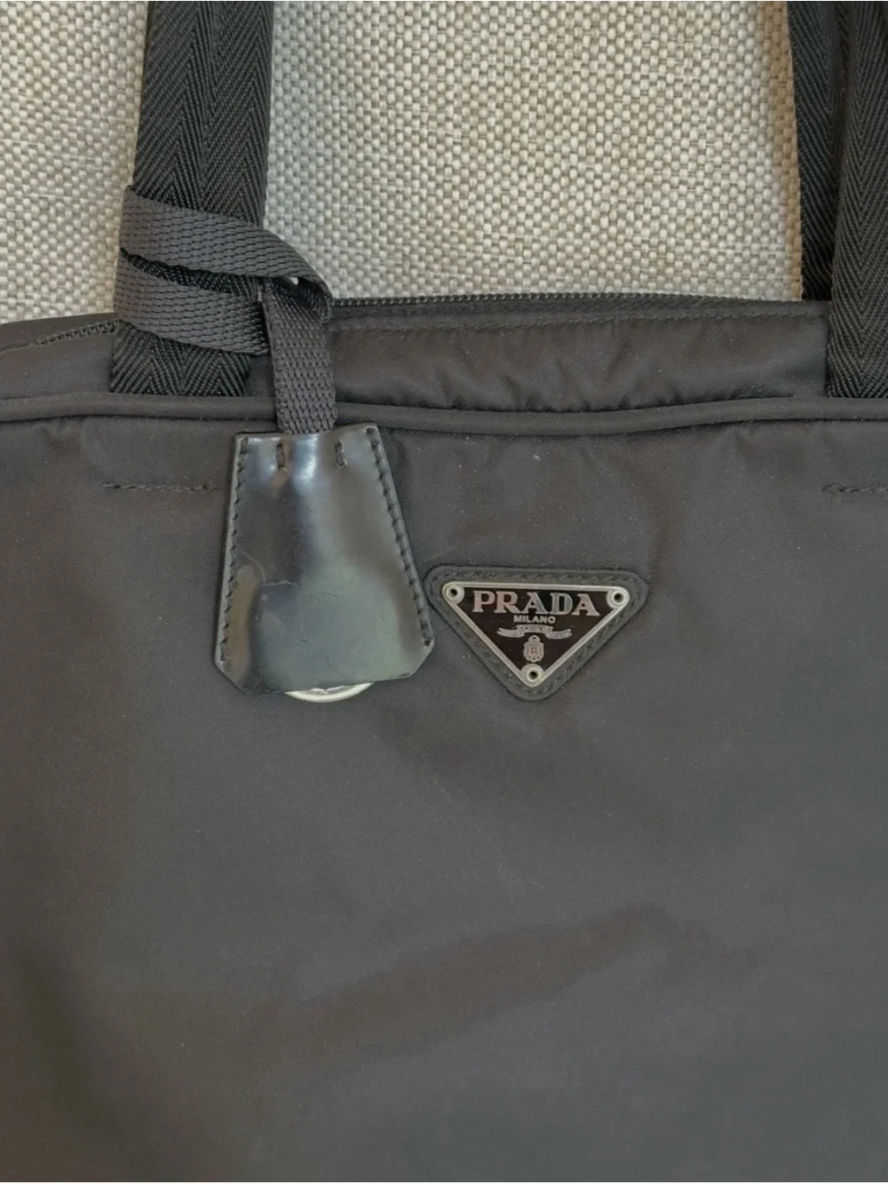 UNISEX PRADA Black Nylon Tote Bag with Silver Hardware Zipper and Padlock.